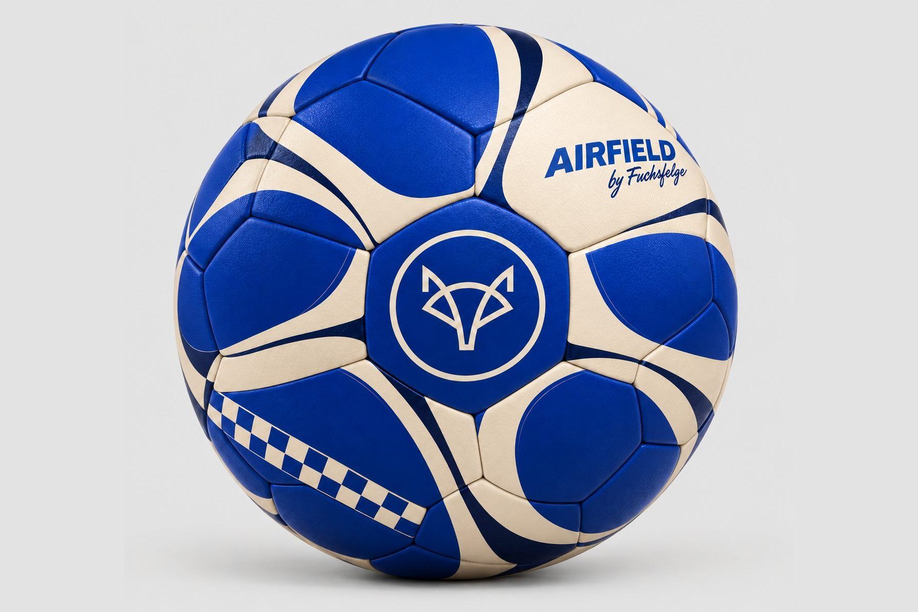 Fußball in Blau und Creme mit Fuchs-Emblem